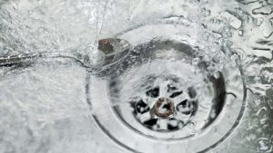 When to Call a Plumber for a Clogged Drain